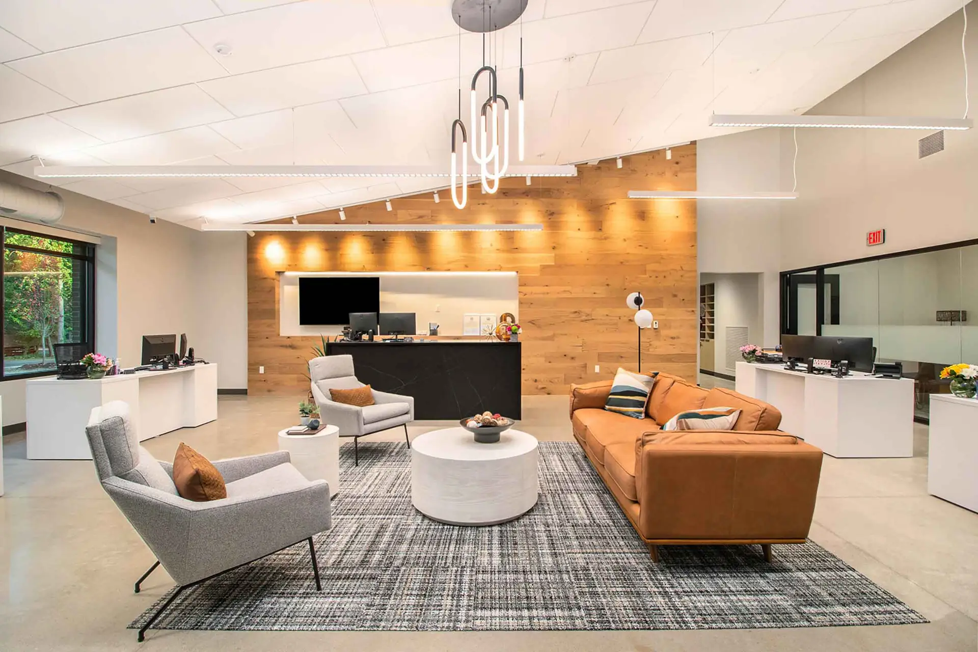 Fabric and upholstery sample racks inside the Holland, Michigan showroom, organized for browsing and comparison