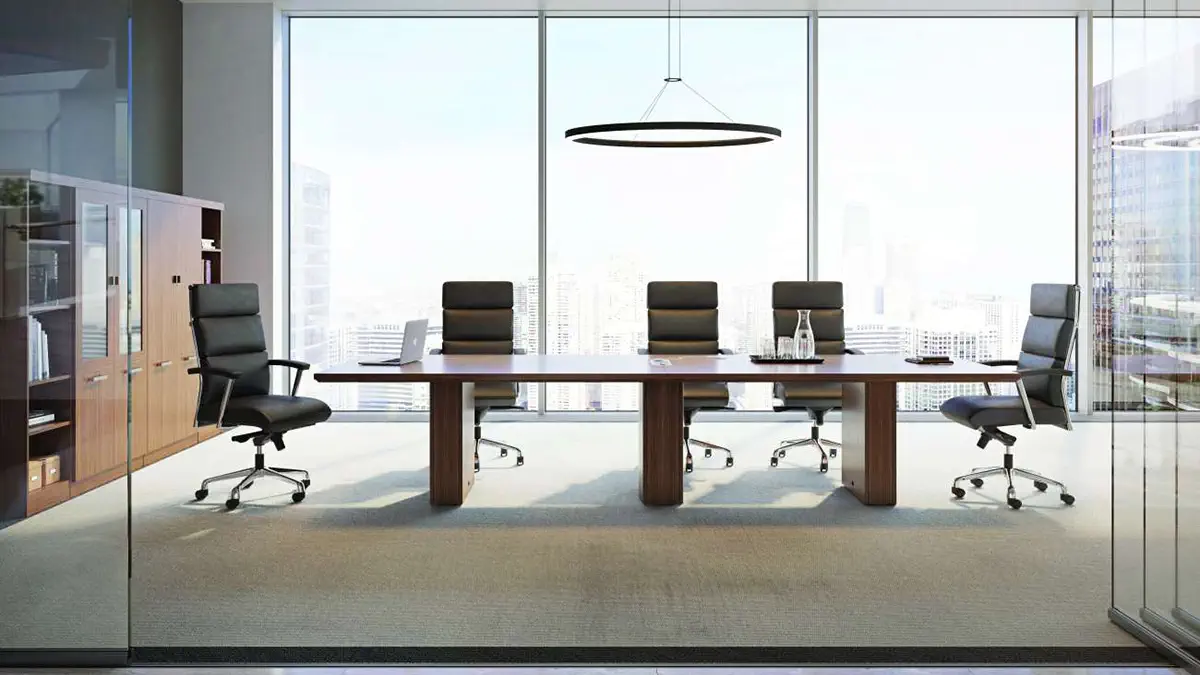 OFS Meeting Room conference table in a glass walled boardroom with black executive chairs and city views.