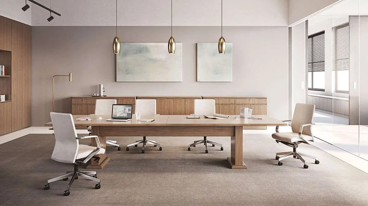 OFS Meeting Room table in a contemporary conference space with upholstered chairs and wood storage.