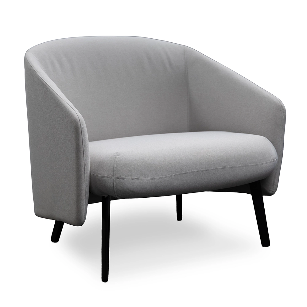 Studio TK Cover Lounge Chair in gray upholstery.