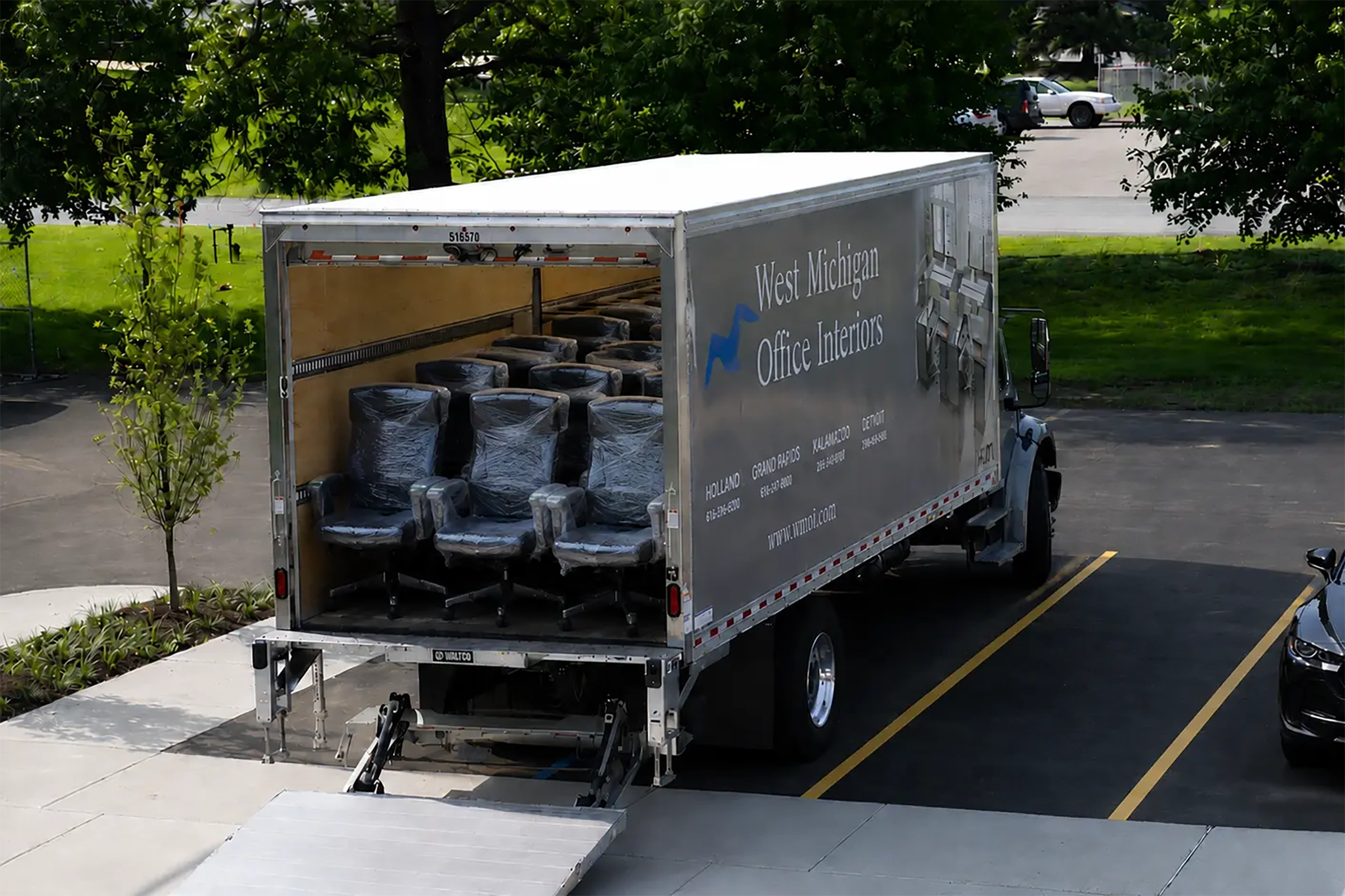 WMOI truck with chairs wrapped during a relocation.