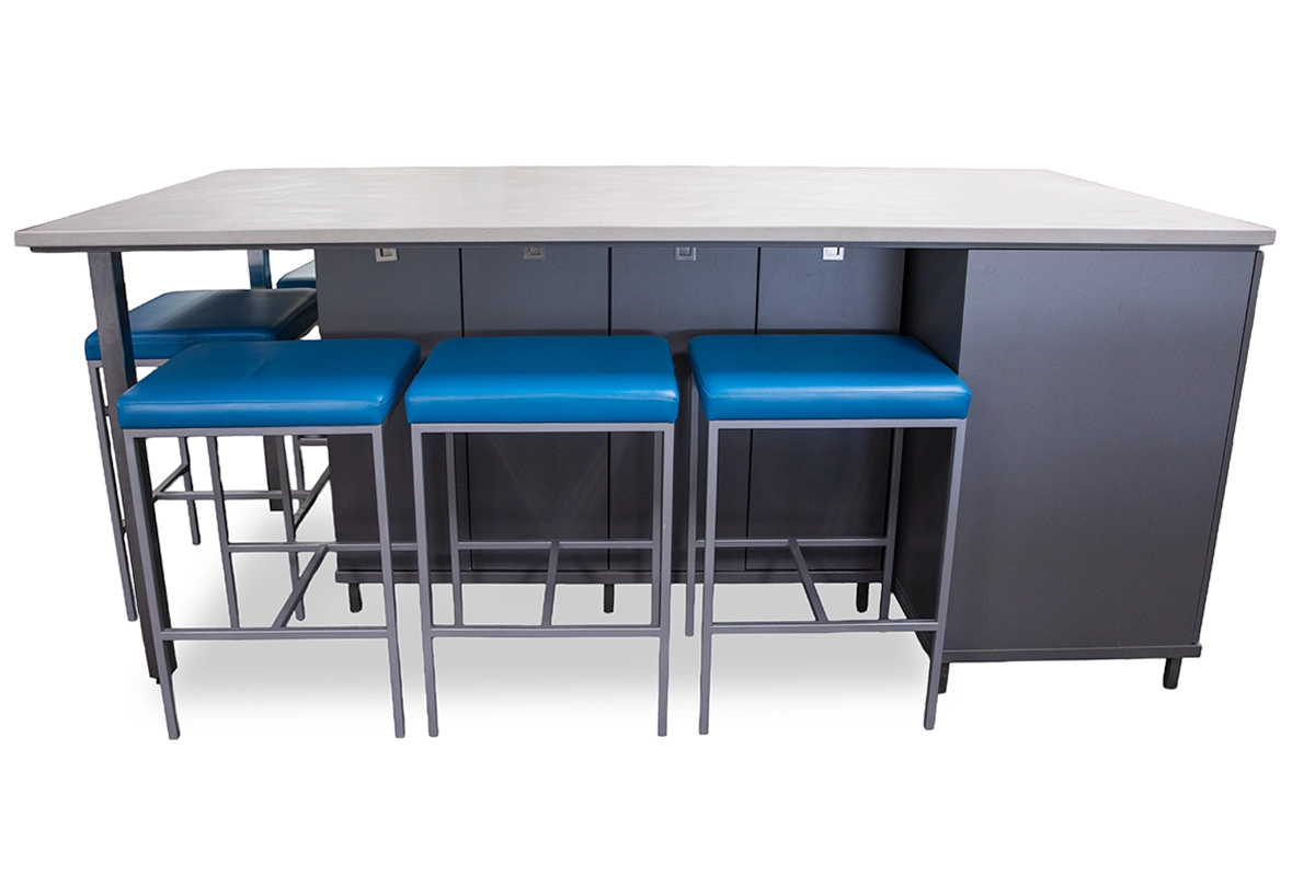Marble topped kitchen island with blue stools and gray cabinets.