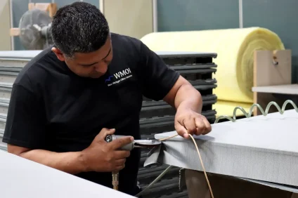 Panels being remanufactured as part of WMOI's office furniture remanufacturing process.